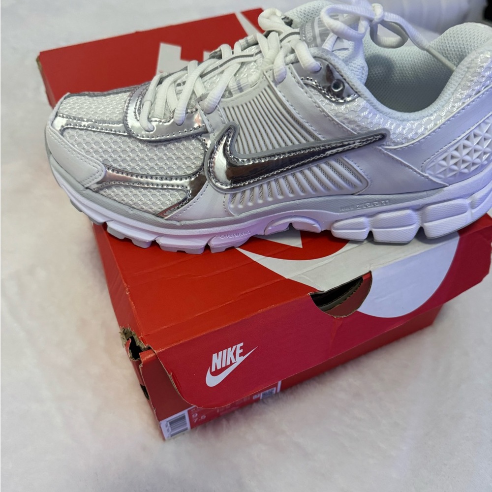 Nike Women's Silver and White Sneakers